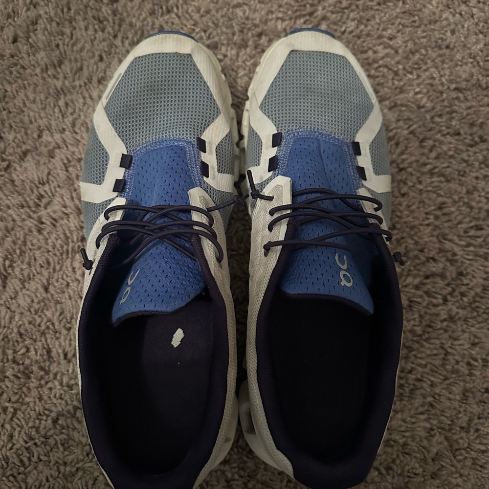 2 pairs on cloud running shoes